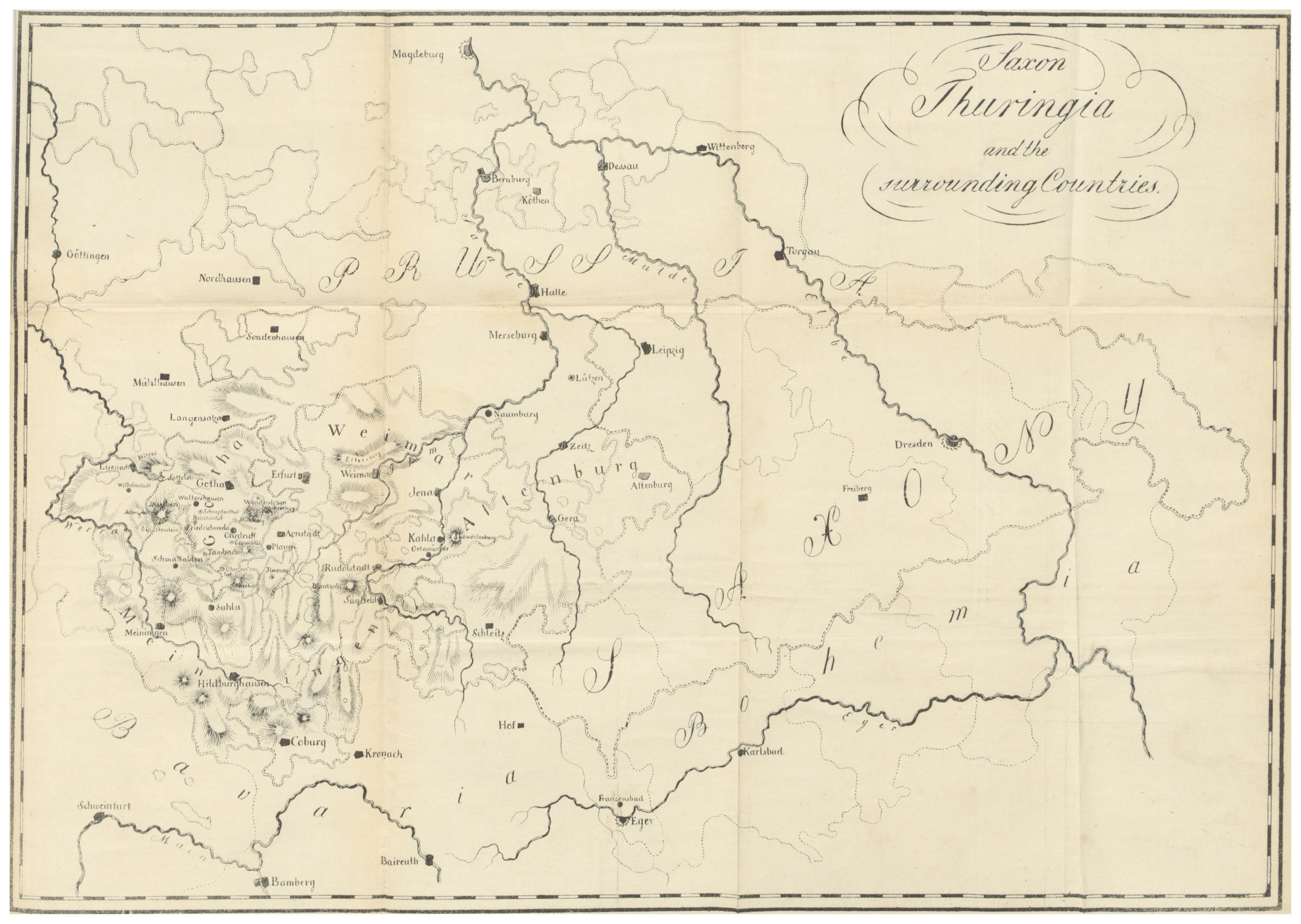 Eine Papierkarte des Königreichs Thüringen und der umliegenden Länder, mit Text, der die Grenzen und Regionen beschreibt.
