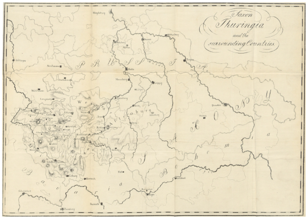 Eine Papierkarte des Königreichs Thüringen und der umliegenden Länder, mit Text, der die Grenzen und Regionen beschreibt.