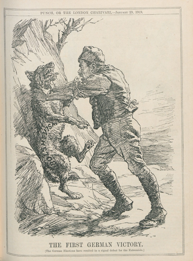 Ein aufgeschlagenes Buch mit einer Illustration eines Mannes mit Hut und entschlossener Miene und einem Hund, der neben ihm steht und aufmerksam hochschaut; der Text auf dem Buch lautet "Das erste deutsche Sieg."