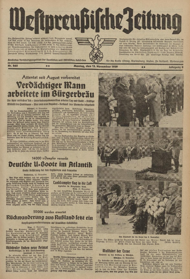 Schwarze und wei├če Titelseite einer deutschen Zeitung vom 13. November 1939, betitelt 'Weitpreubliche Zeitung', mit einer Gruppe von Menschen in traditioneller deutscher Kleidung in einer feierlichen Szenerie.