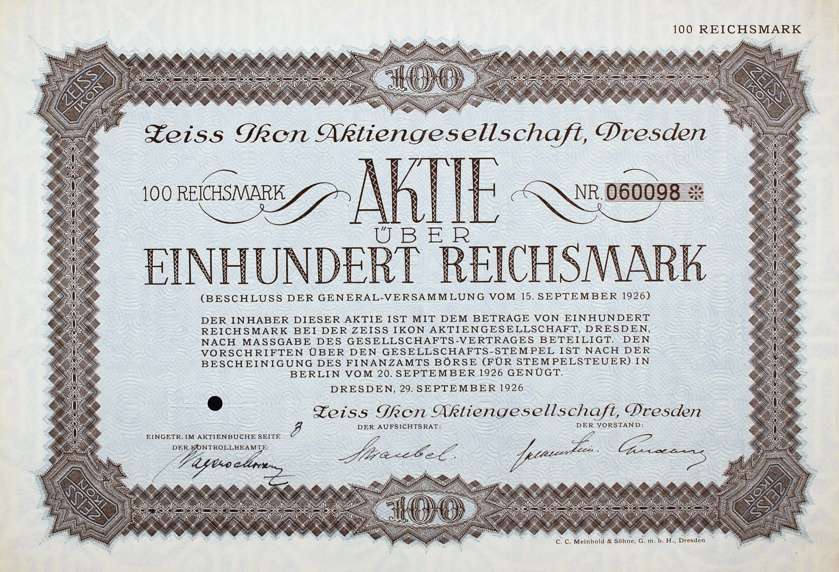 Deutsches Aktienzertifikat über einhundert Reichsmark mit schwarzem Rand und gedrucktem Text.