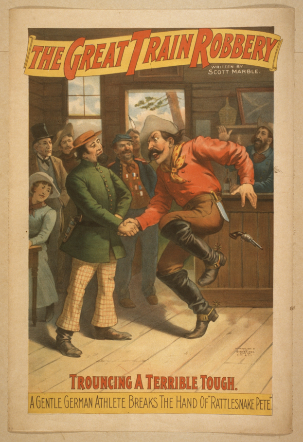 Ein Plakat zeigt eine Gruppe von Menschen auf einem Boden, einer hält eine Waffe, mit Text oben und unten 'Die große Zugüberfall - Trouching a Terrible Tough'.